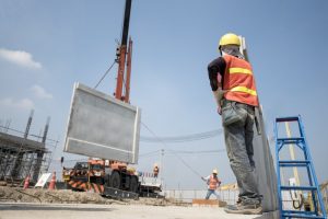 What hazards can endanger crane lifting operations?